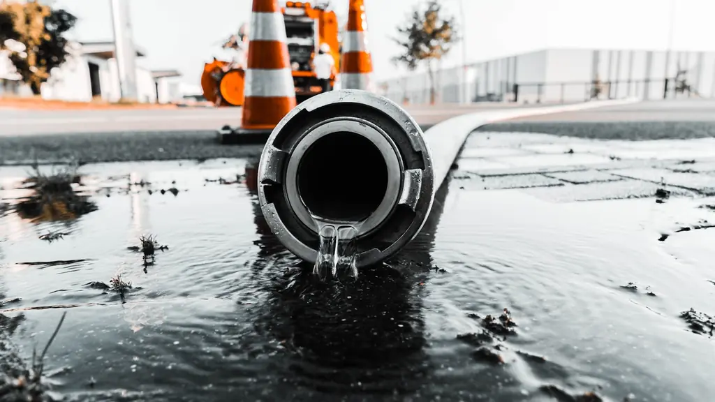 Water pouring from a broken pipe